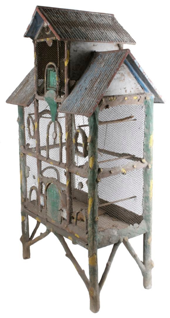 From Argentina, a large, faux bois birdhouse.