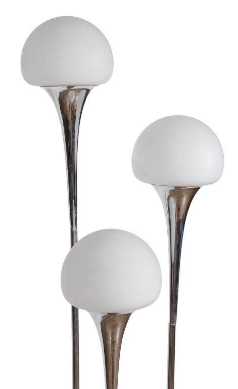 Can be used as either a floor lamp or ceiling fixture.