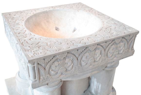 HEAVILY CARVED STONE BAPTISMAL FONT