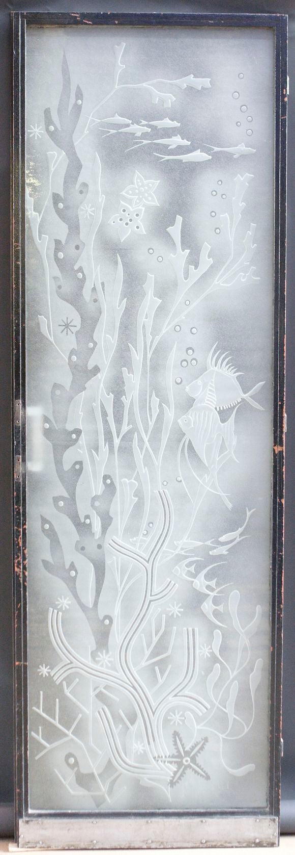 Acid Etched Glass with metal frame.  Was originally a door.