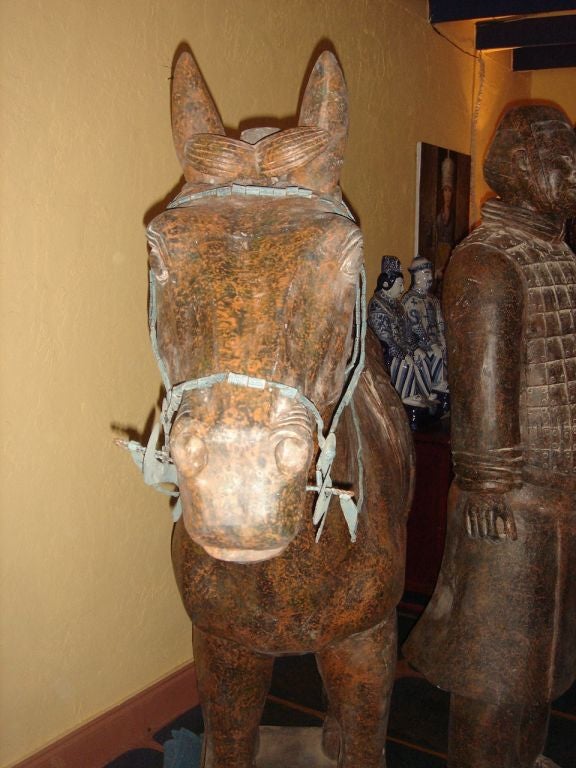 A life size Chinese horse and warrior statues with bronze bridle, made from the original 2,000 year old molds and clay pits from the Xian Museum (can be sold separately) Great for a garden or entrance of home Original certificate from Museum 