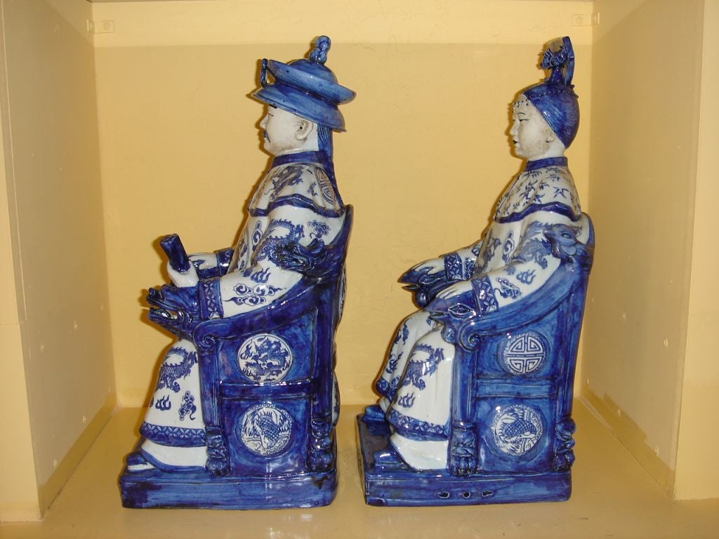 Chinese blue and white hand painted ceramic emperor and empress statues, seated on thrones, finely detailed, late Qing Dynasty, Shanxi Province