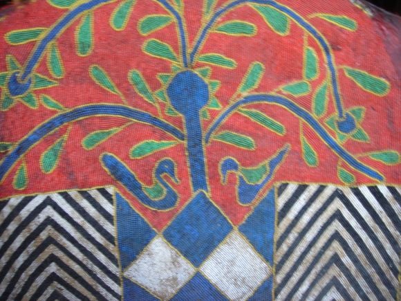 African beaded arm chair