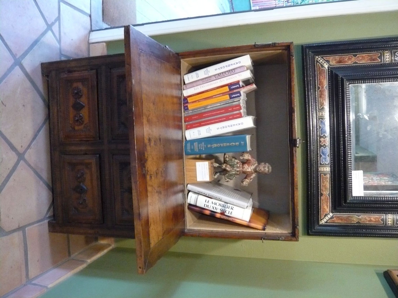 Empty and perfect for use as a desk or bar.<br />
Walnut, set on original stand.