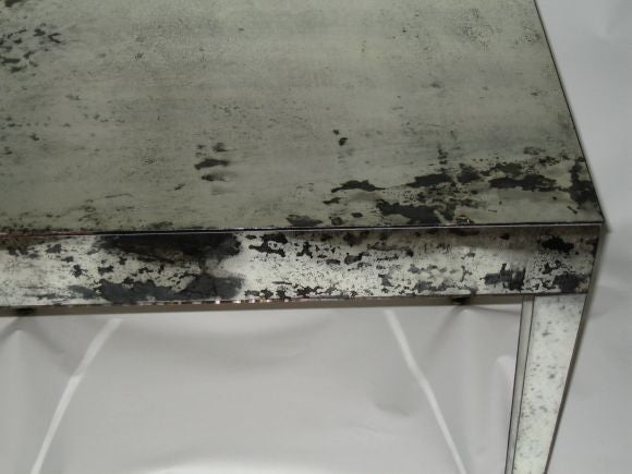 Contemporary A Pair of Antiqued Mirrored End Tables