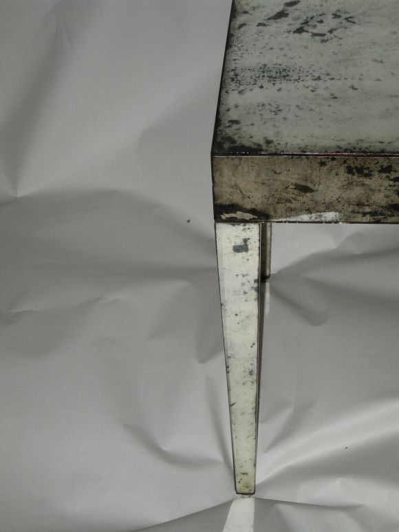 A Pair of Antiqued Mirrored End Tables 1