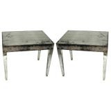 A Pair of Antiqued Mirrored End Tables