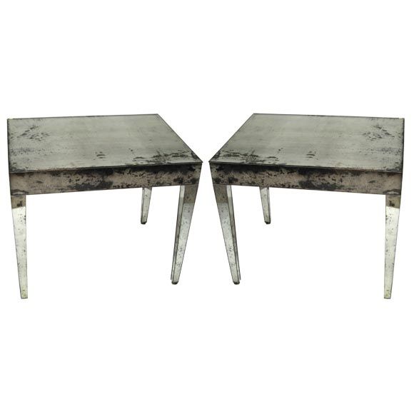 A Pair of Antiqued Mirrored End Tables