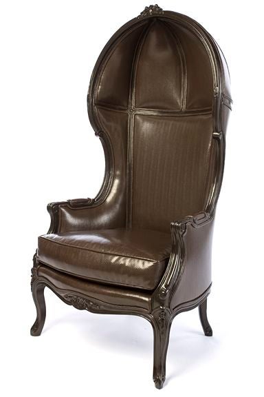 Gorgeous chair upholstered in chocolate brown faux snakeskin with a rich brown lacquer on the wood finish.  Available in COM. 31