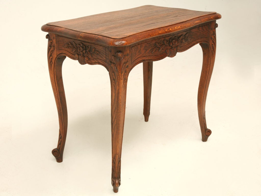 French hand-carved oak Louis XV style end table/petite coffee table with beautiful acanthus leaf detailing, cabriloe legs, escargot feet and it is wooden-peg constructed.