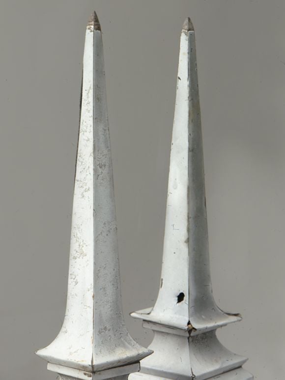 Antique zinc roof-top architectural spire-form finials. In the 18th century, zinc became a popular roofing material in Belgium and France. Throughout the 18th and 19th centuries, zinc was also molded into other architectural forms, including roof