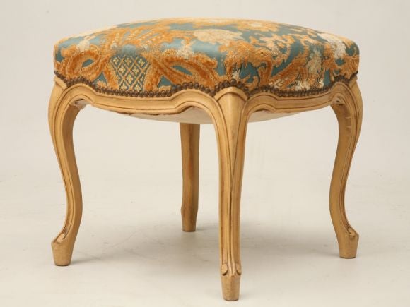 Louis XV-style carved tabouret (small footstool) with embroidered upholstery