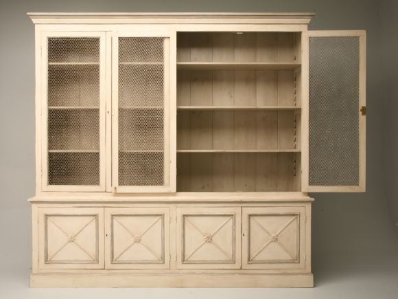 Directoire period style bibliotheque, circa 1793-1804. Handcrafted in the midlands by English craftsmen from old timber. We are now reproducing these in our workshop in Chicago, only because the owner of the English company retired. You can choose