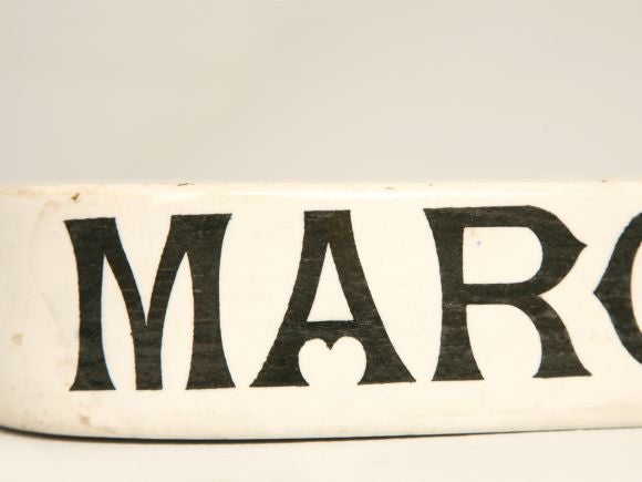Parnall & Sons shop margarine display platter made from glazed stoneware. Used in a store to sell margarine by the quanity. The back reads: Parnall, The Shopkeepers Shop, Parnall & Sons Ltd, 25-26 Hosier Lane, West Smithfield London E.C.I, Works