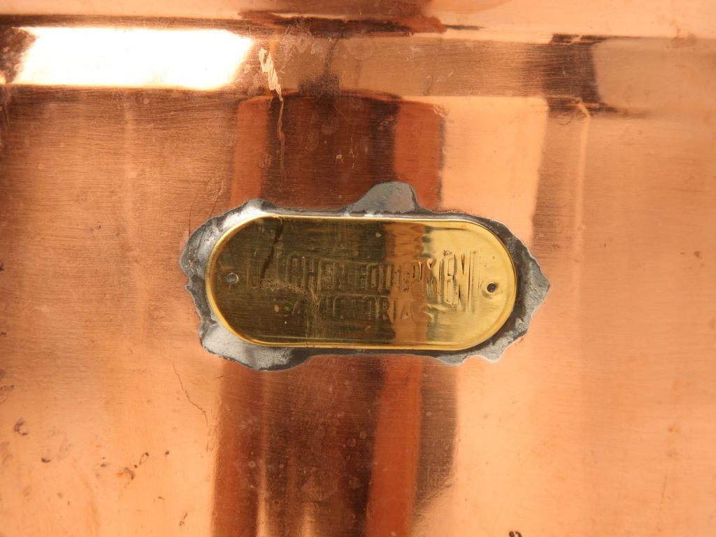 This would make a great kitchen decoration! Vintage brass and copper beverage dispenser with a spigot that was intended for commercial use for a restaurant. We think the label reads 'KITCHEN EQUIPTMENT 94 VICTORIA ST. The measurements below include