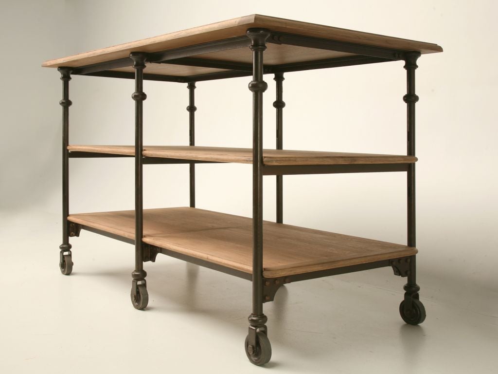 Reproduction industrial kitchen island/work station made from French oak with a steel frame.