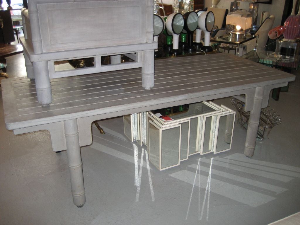 This is a group of signed McGuire faux bamboo outdoor patio furniture to include:<br />
Pair of oversized armschairs<br />
Dining Table<br />
6 Folding Chairs<br />
1 Console Table<br />
1 Coffee Table<br />
This group is labeled with a metal