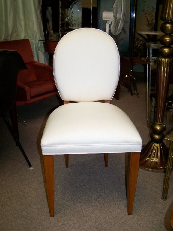 Pair of side chairs upholstered with white silk attributed to Andre Arbus.