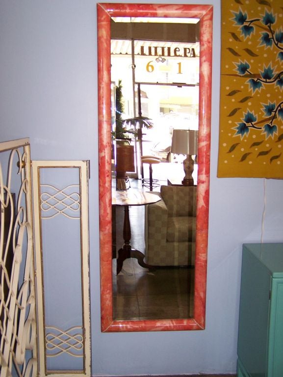 Pair of tall mirrors cover with goatskin coral color.
