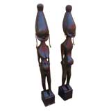 Tall pair of stylized realism Statues