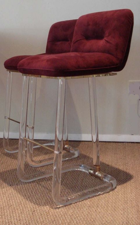 Four Signed Lucite Bar Stools.