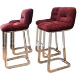 Four Signed Lucite Bar Stools.