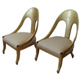 Pair of spoon back lounge chairs