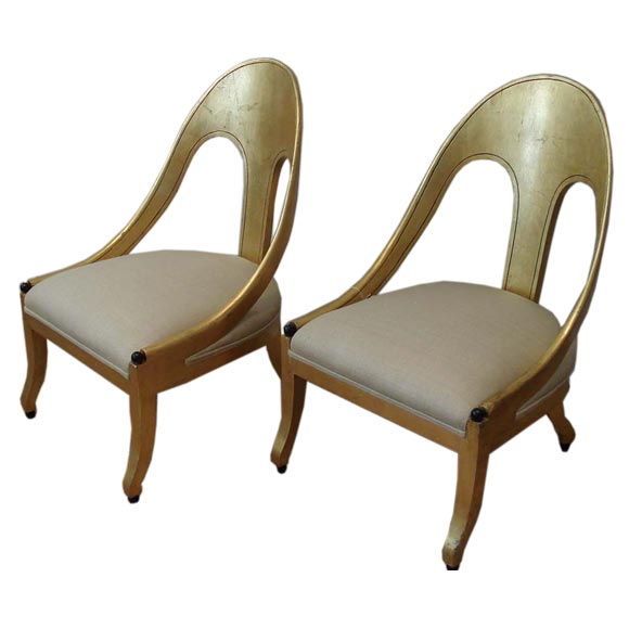 Pair of spoon back lounge chairs