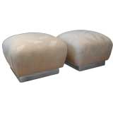 Pair of brass  base poufs.