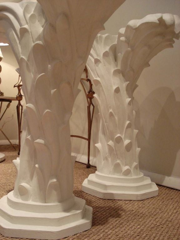 Amazing pair of consoles in the manner of Serge Roche. Plaster finish. Can be sold individually.