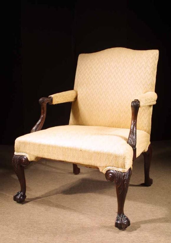 Mid-Georgian mahogany Gainsborough arm chair, after designs by Thomas Chippendale in 