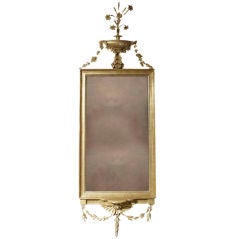 A Decorative George III Style Carved and Giltwood Mirror. English 19th Century