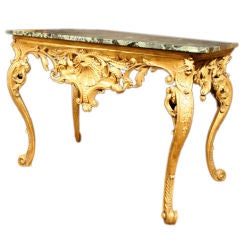 Stricking Continental Rococo Marble Top Carved and Gilt Console. Mid 18th C