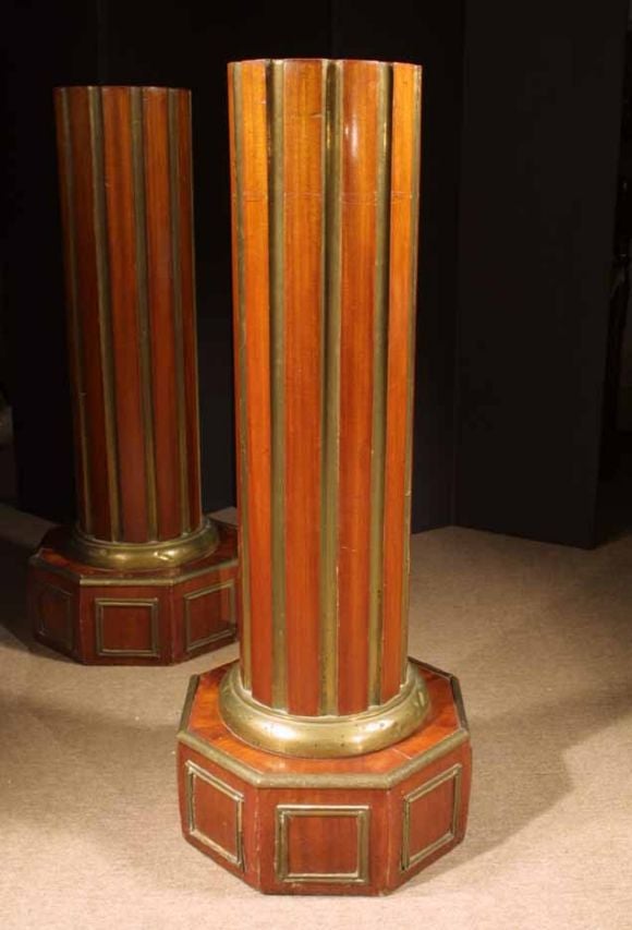 # N099 - Pair Columns in the Russian Jacob style (named after the famous French cabinet maker Georges Jacob). It's characteristics are the use of brass moldings and geometric shapes. The rectangular top having a black tooled leather writing surface,
