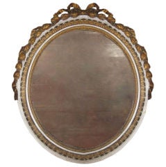 Louis XVI Painted and Parcel Gilt Mirror. Late 18th century