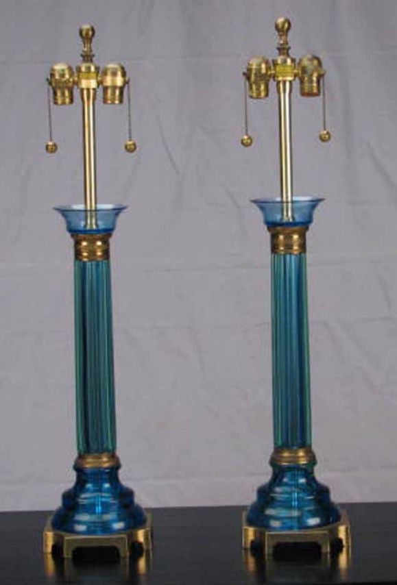 Magnificent PAIR Murano art glass lamps by Venini for Marbro. Note the incredible blue glass on the base while the shaft shows blue with green.   <br />
Venetian glassmakers are recording working as early as 982, forming a guild by 1255 and in 1291