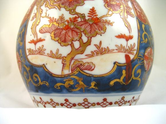 An exceptional Japanese porcelain double-gourd vase, an Imari Export piece, possibly an early Fukagawa decorative piece. <br />
<br />
Their characteristic style, combining brilliant painted and gilt decoration with a pure white porcelain body