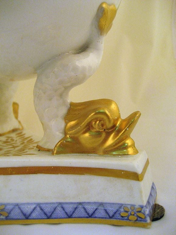 A beautifully decorated Ridgeway Ice Pail & Cover, raised on dolphin-shaped legs on a triangular platform base. Finely gilt, and the molded body has an excellent form, with a gilt 