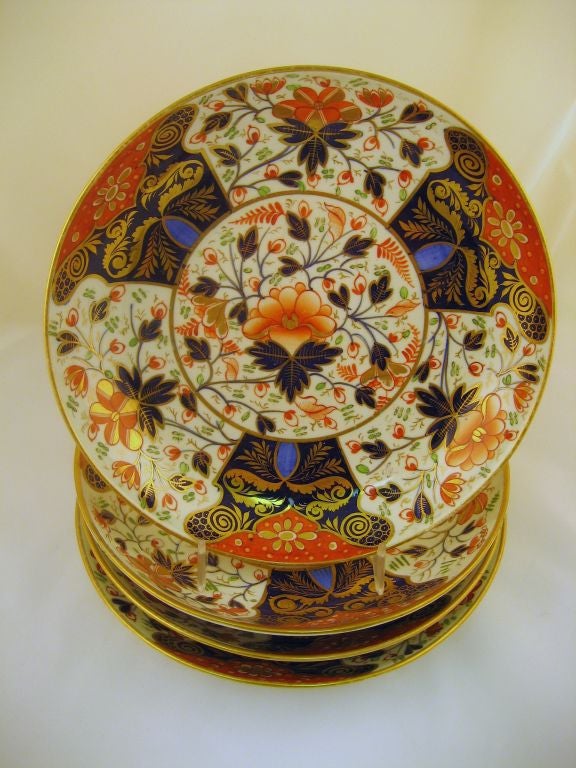 A set of 4 brilliantly crafted Derby Porcelain plates, with their Japanese-influenced 