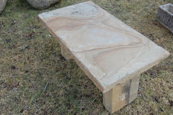 This chunky sandstone bench is the perfect focal point for your garden nicely figured top and sturdy legs. At the end of a pool or garden path this is the perfect bench.