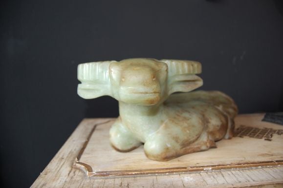 Beautiful hand carved soap stone water buffalo, resting position with uplifted head and charming expression.
