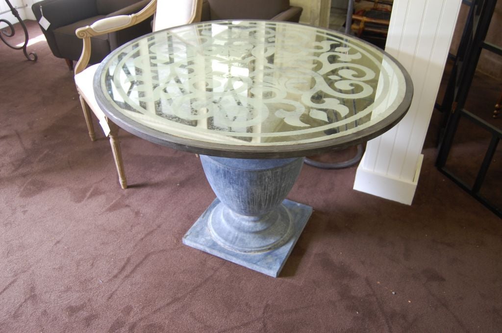 Mirror topped table with zinc base