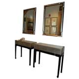 Pair of silver leaf consoles with matching mirrors