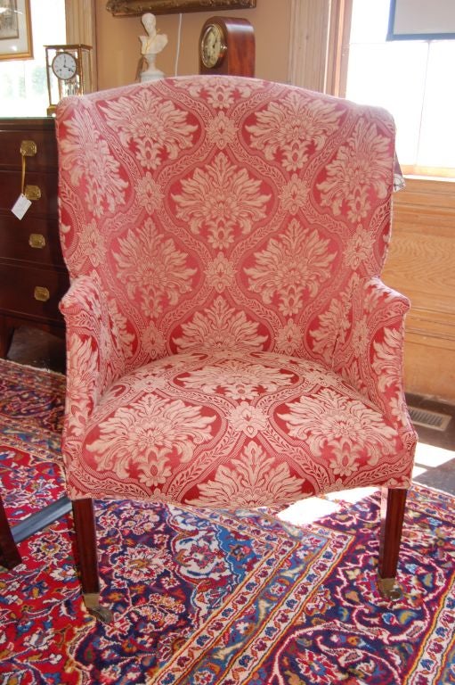 Period Federal barrel back wing chair cira 1800-1810<br />
upholstered in age appropriate brocade.