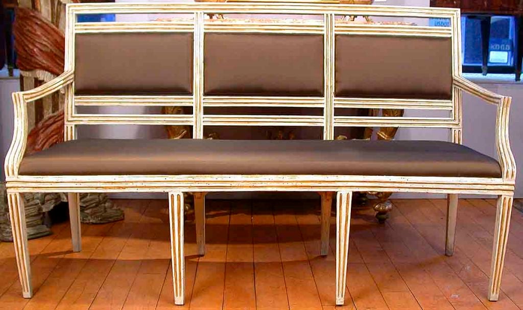A Pair of Neoclassic Parcel-gilt Cream-painted Settees