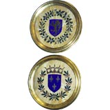 A Pair of Brass Mounted Armorial Plaques