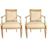 A Pair of Italian Neoclassic Painted & Parcel Gilt Armchairs