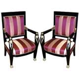 A Pair of Italian Empire Ebonized Fauteuils
