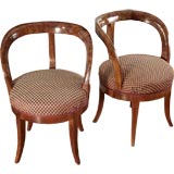 An Unusual Pair of Barrel Back Biedermeier Chairs