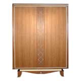 An Art Deco Oak and Painted Two-Door Armoire